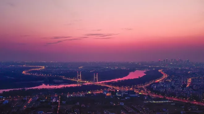 Warsaw skyline with pink hues in the twilight sky